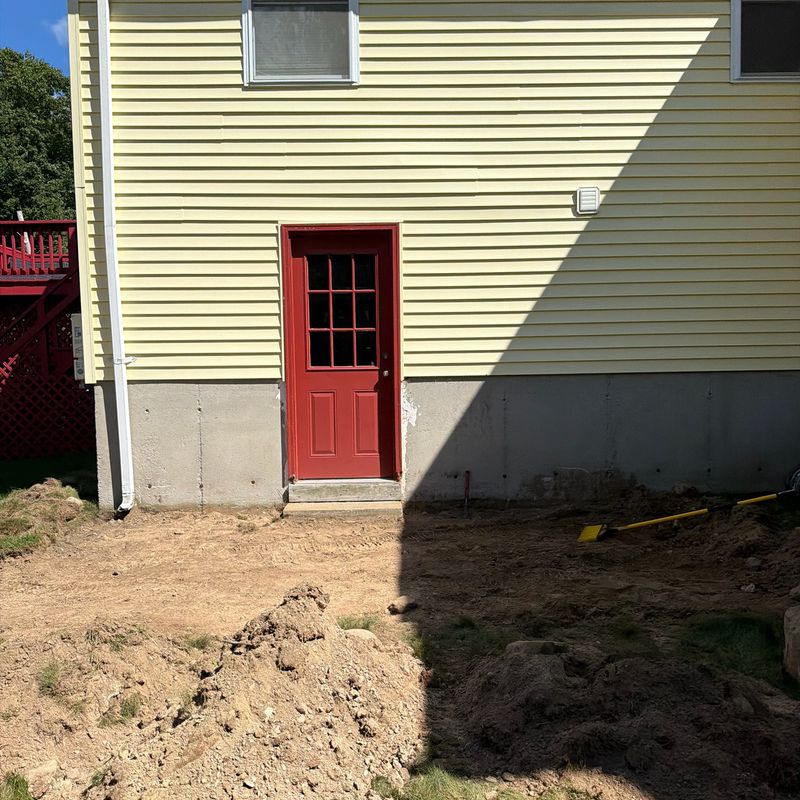 Before: the side door with no walkway