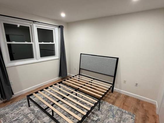 After: the repaired and repainted bedroom